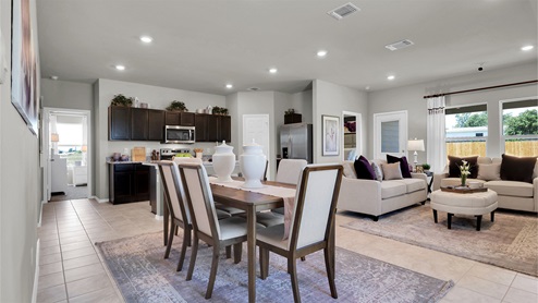 Reynolds Crossing model home open living and dining room view.