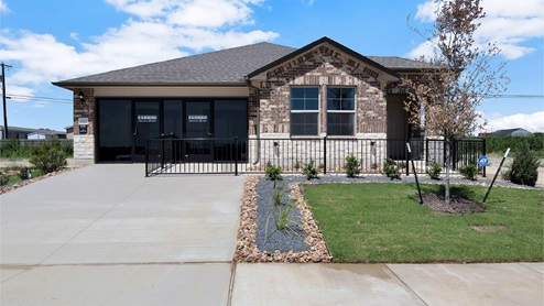 Reynolds Crossing model home exterior with masonry details.