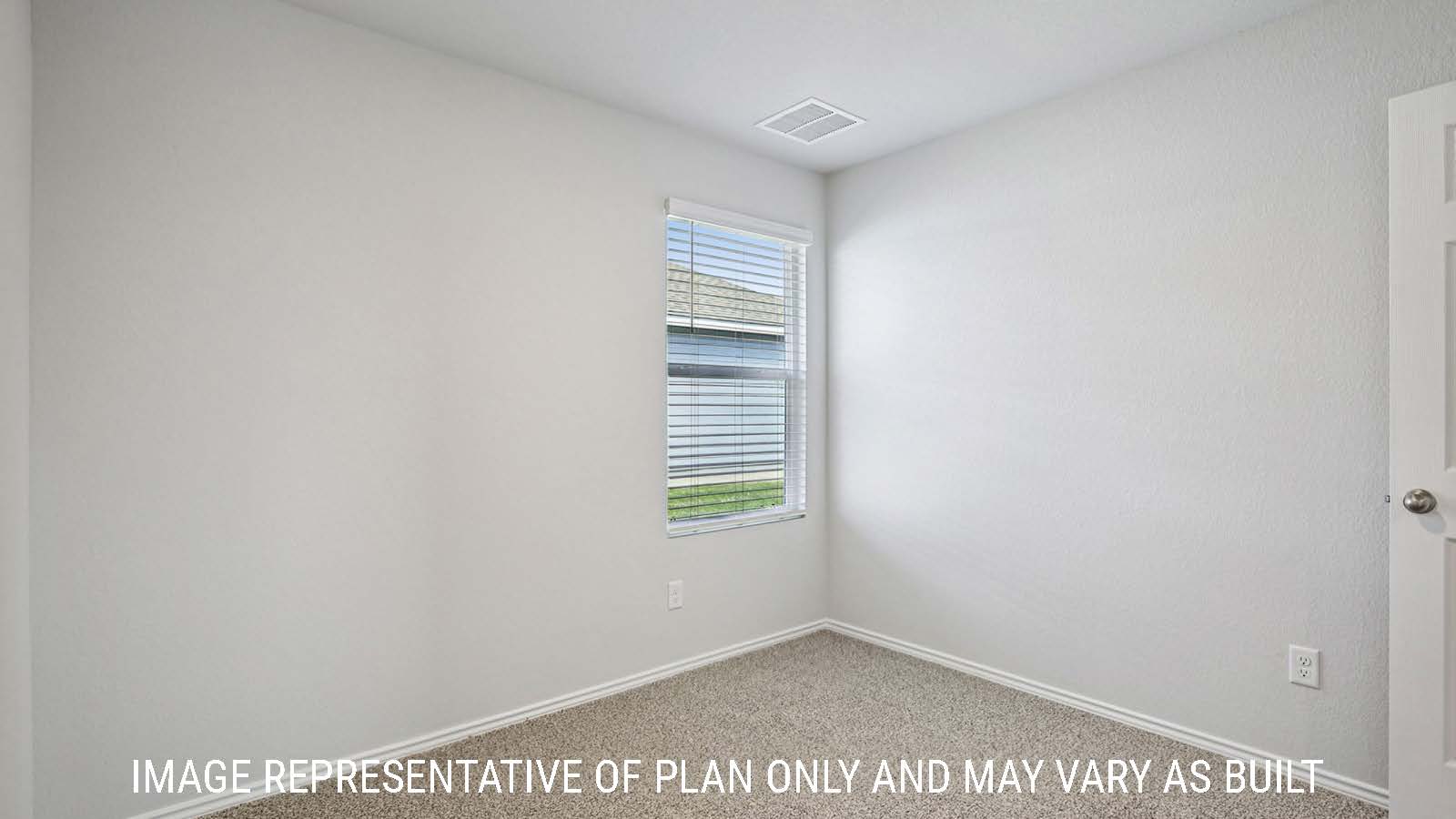 Barton secondary bedroom with carpeted flooring and window for natural lighting.