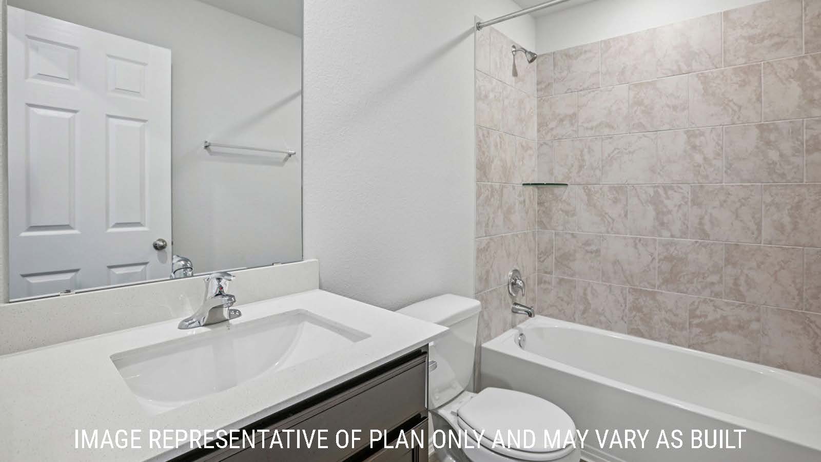 Caprock secondary bathroom with vanity sink and shower and tub combo.