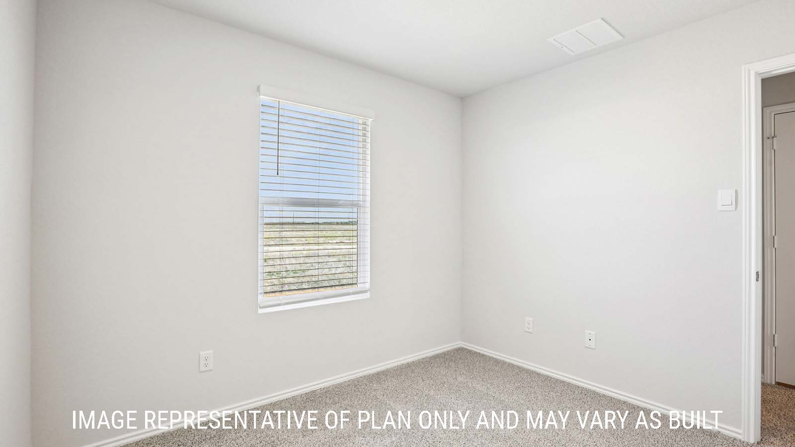 Franklin secondary bedroom with carpeted flooring and window for natural lighting.