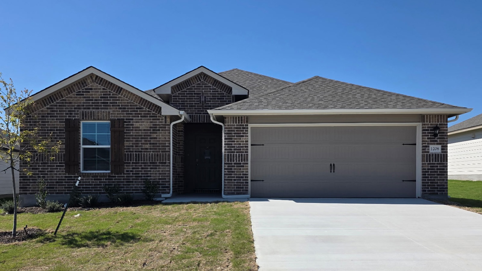 Elgin Front Exterior A Elevation with Brick.