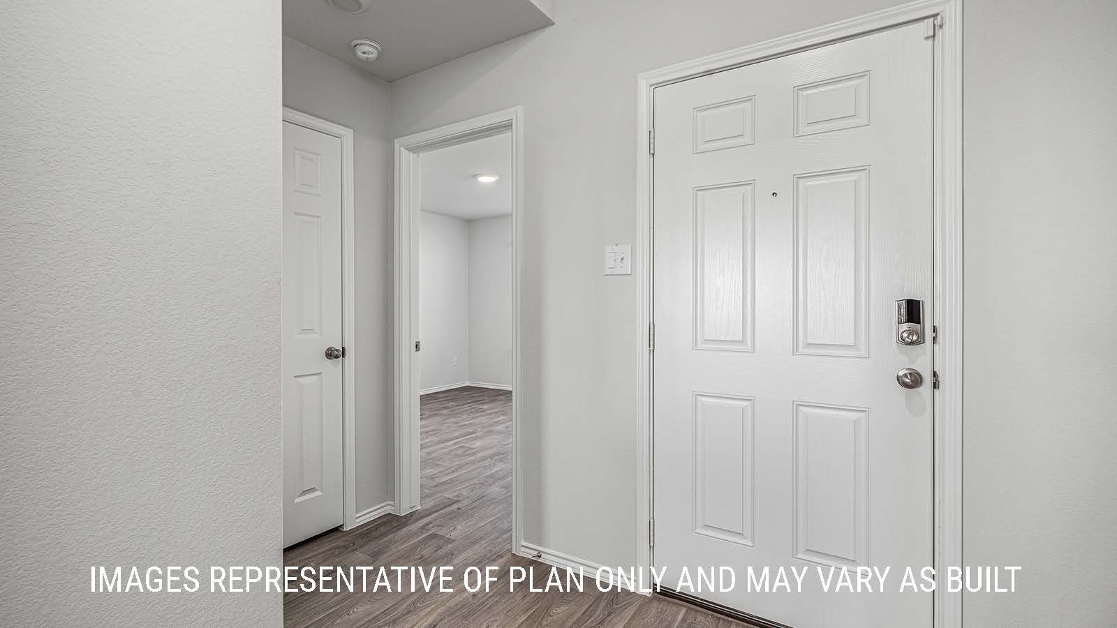 Elgin entry way with view of the secondary bedroom.