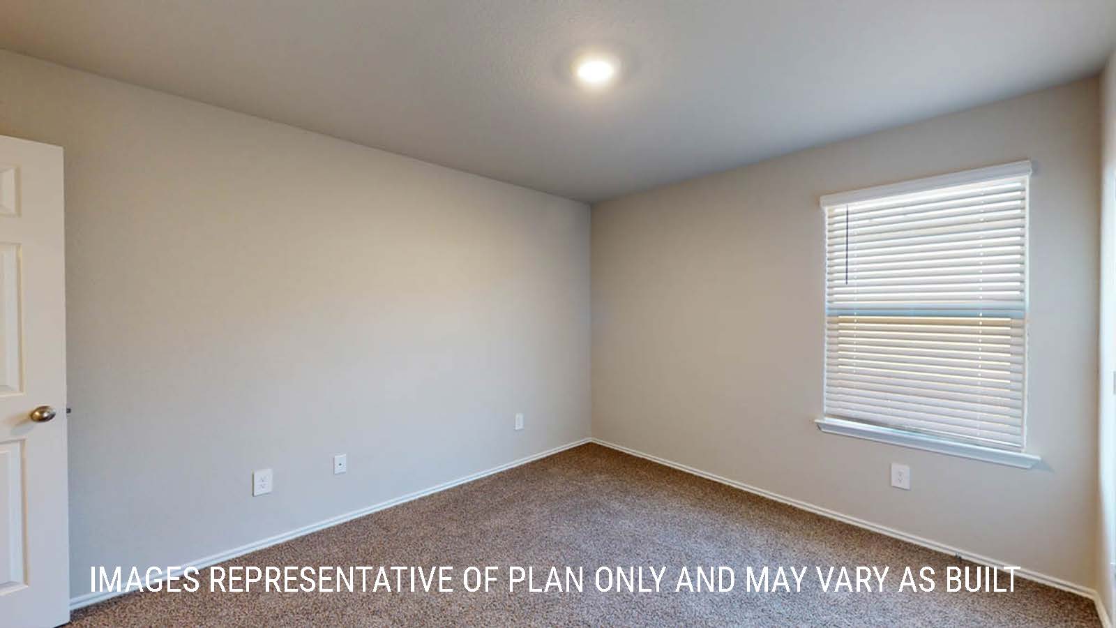Texas Cali secondary bedroom with window and carpeted flooring.