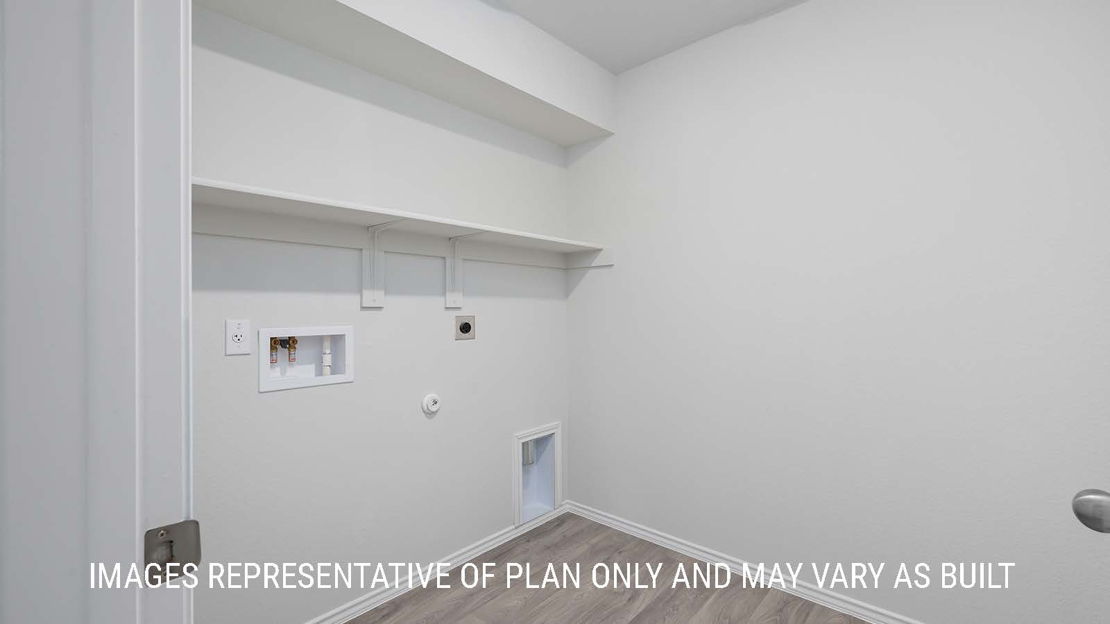 Texas Cali utility room with shelving and washer and dryer connections.