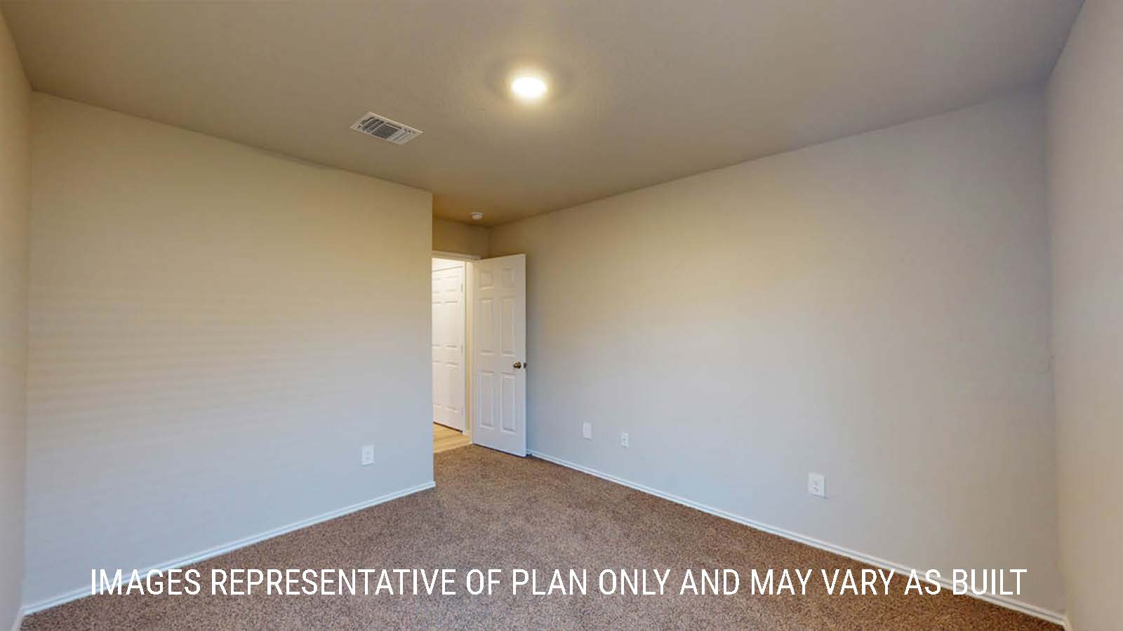 Texas Cali secondary bedroom with carpeted flooring and view of living room.
