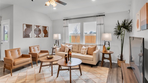 Eastern Wells Model Home living with midcentury modern furniture.
