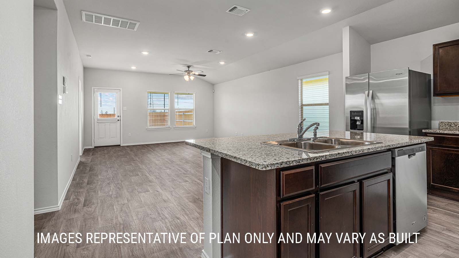 Elgin kitchen with center island with granite countertops.