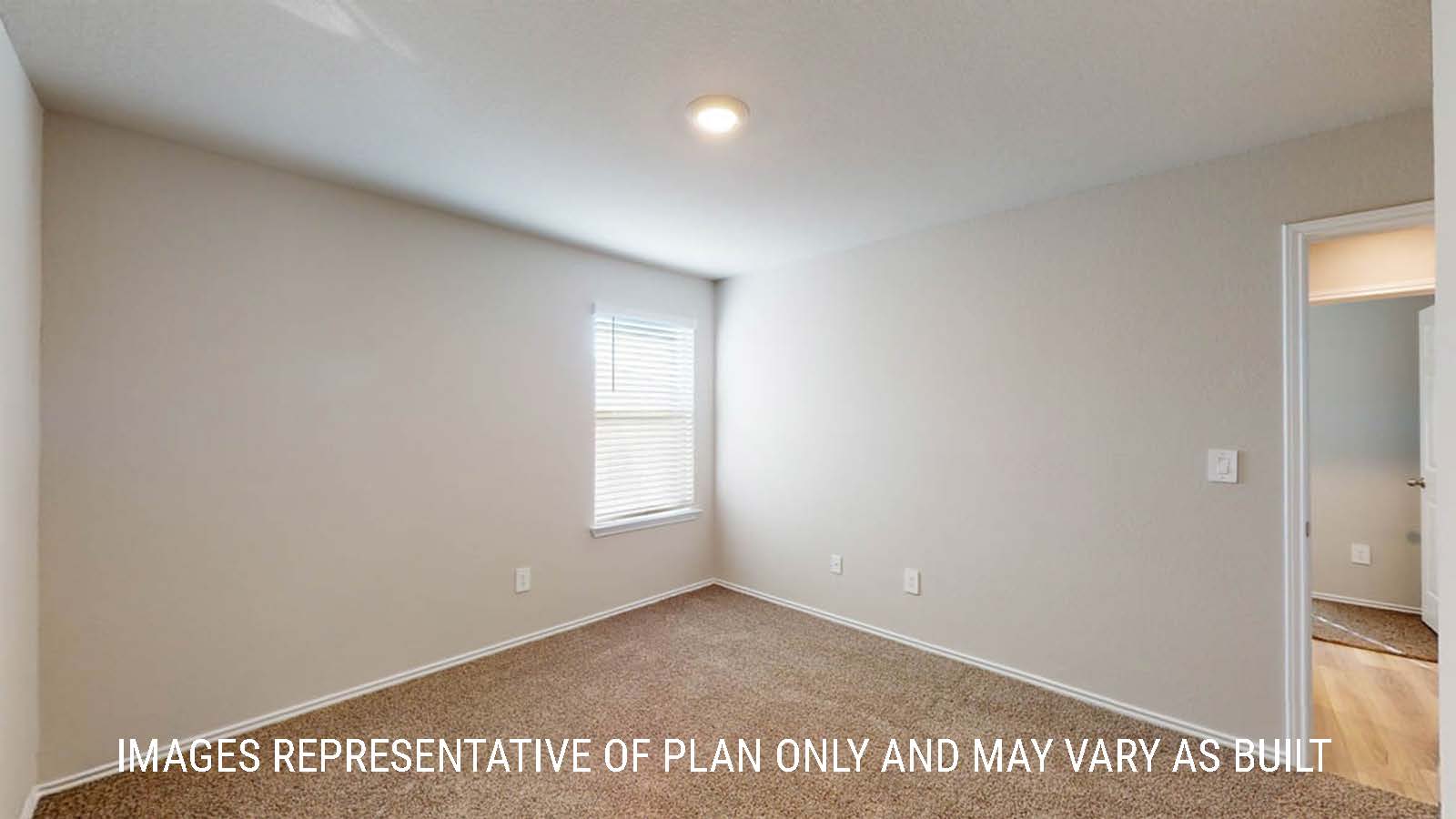 Texas Cali secondary bedroom with window and carpeted flooring.