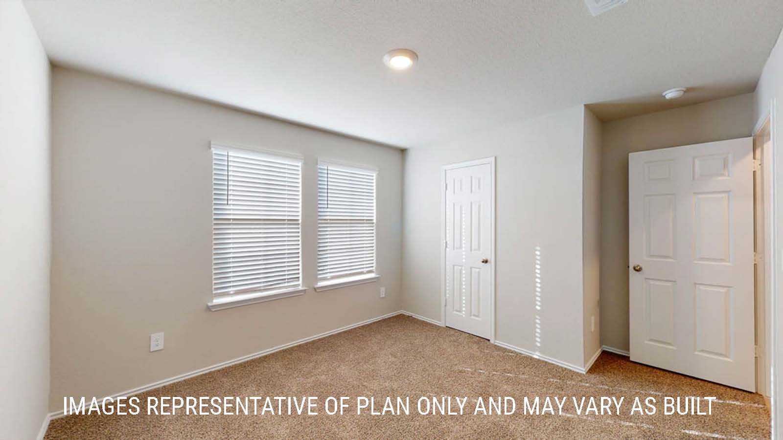 Texas Cali secondary bedroom with windows and carpeted flooring.