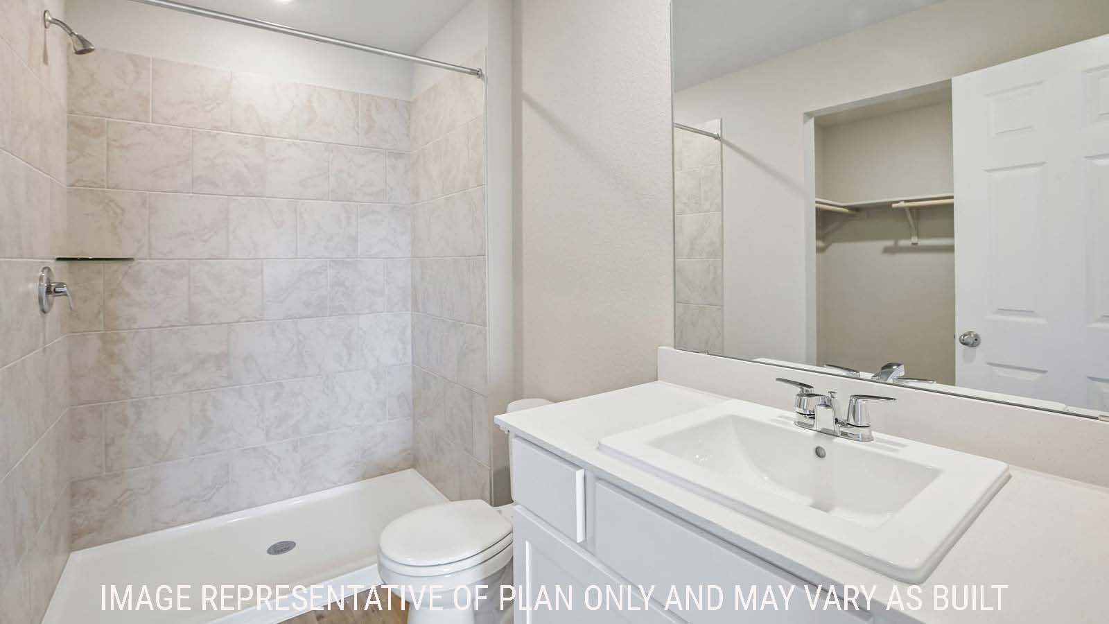 Archer primary bathroom with vanity sink and walk-in shower.