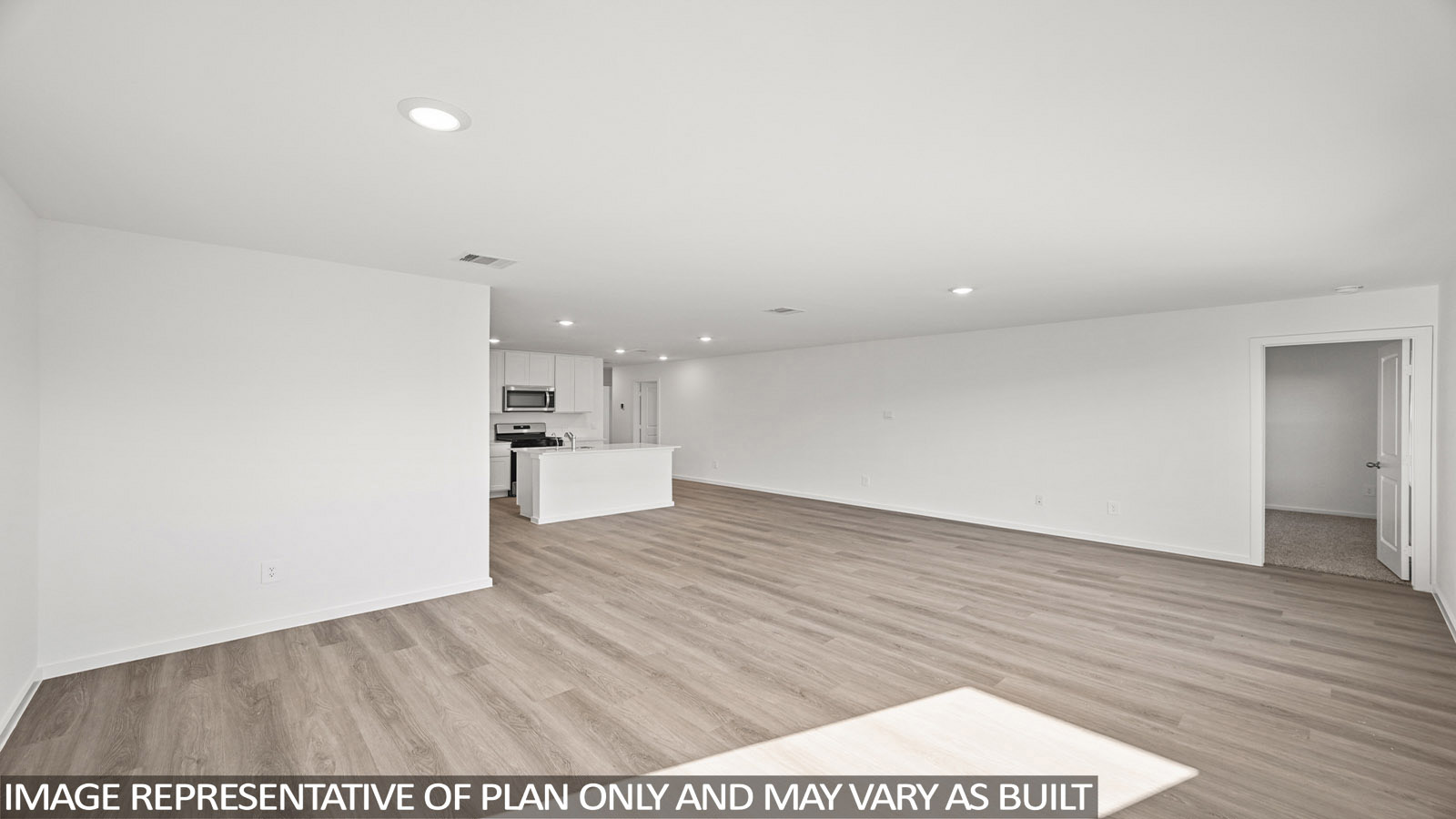 Archer dining room with vinyl plank flooring with view of open-concetp living room and kitchen.