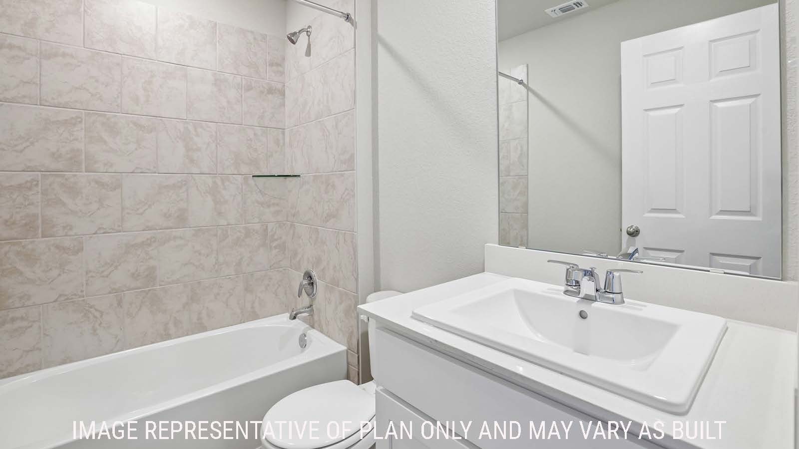 Archer secondary bathroom with vanity sink and shower and tub combo.