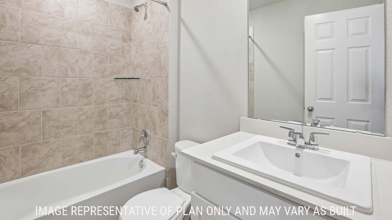 Bradley secondary bathroom with vanity sink and shower and tub combo.