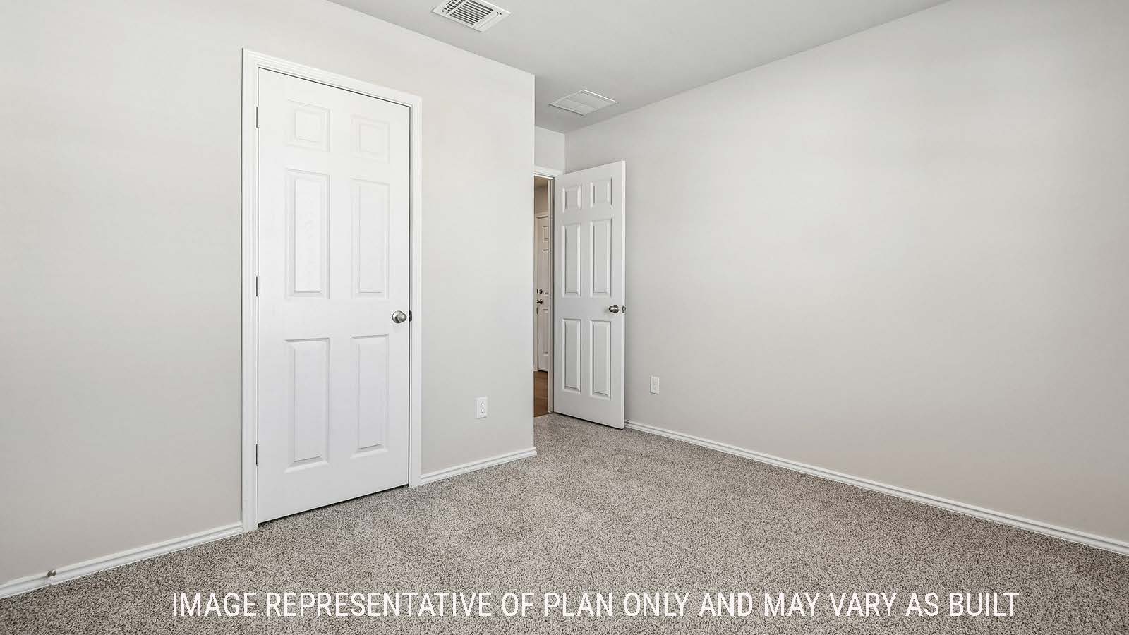 Callahan secondary bedroom with carpeted flooring and view of closet.