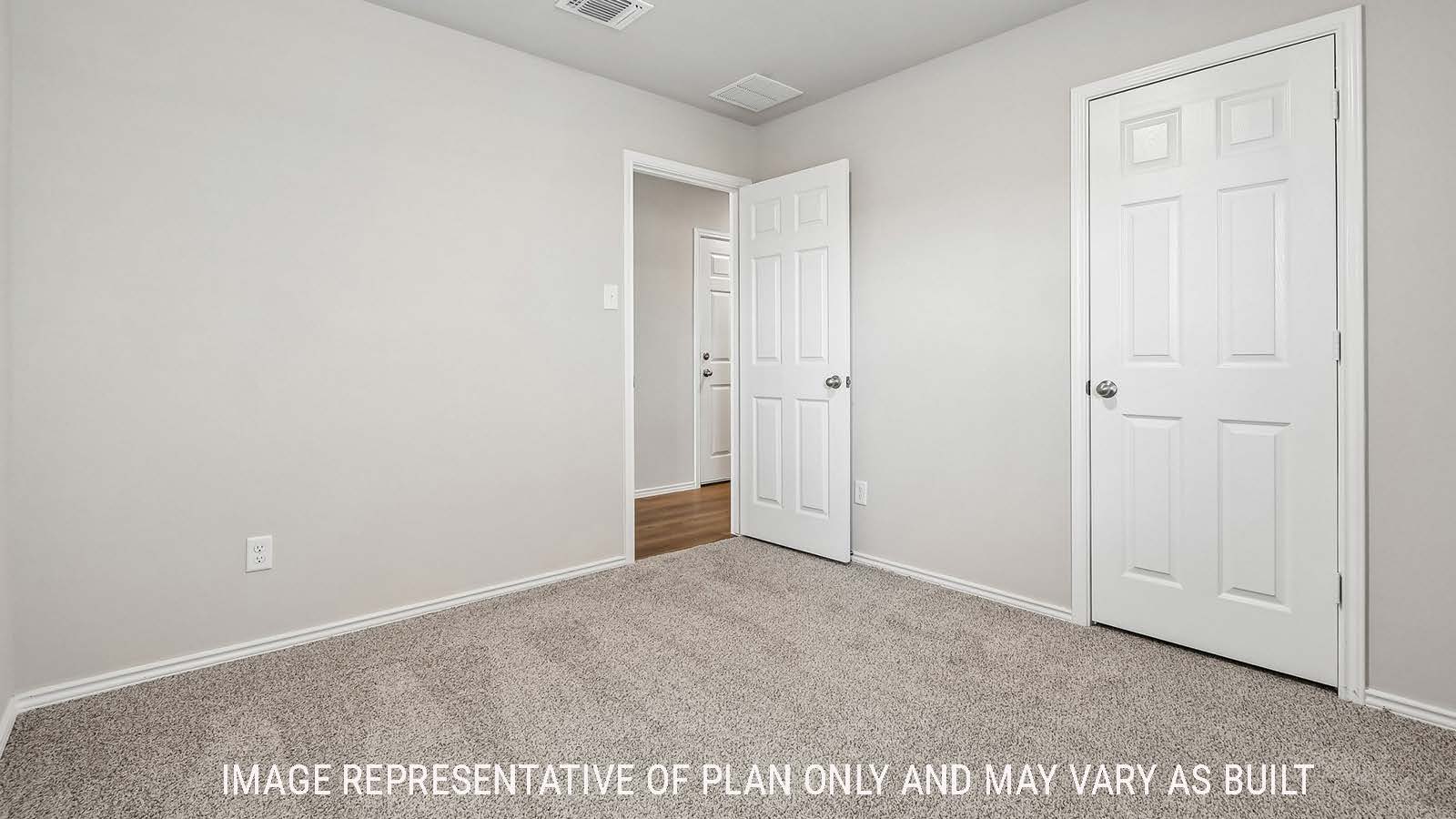 Callahan secondary bedroom with carpeted flooring and view of closet.