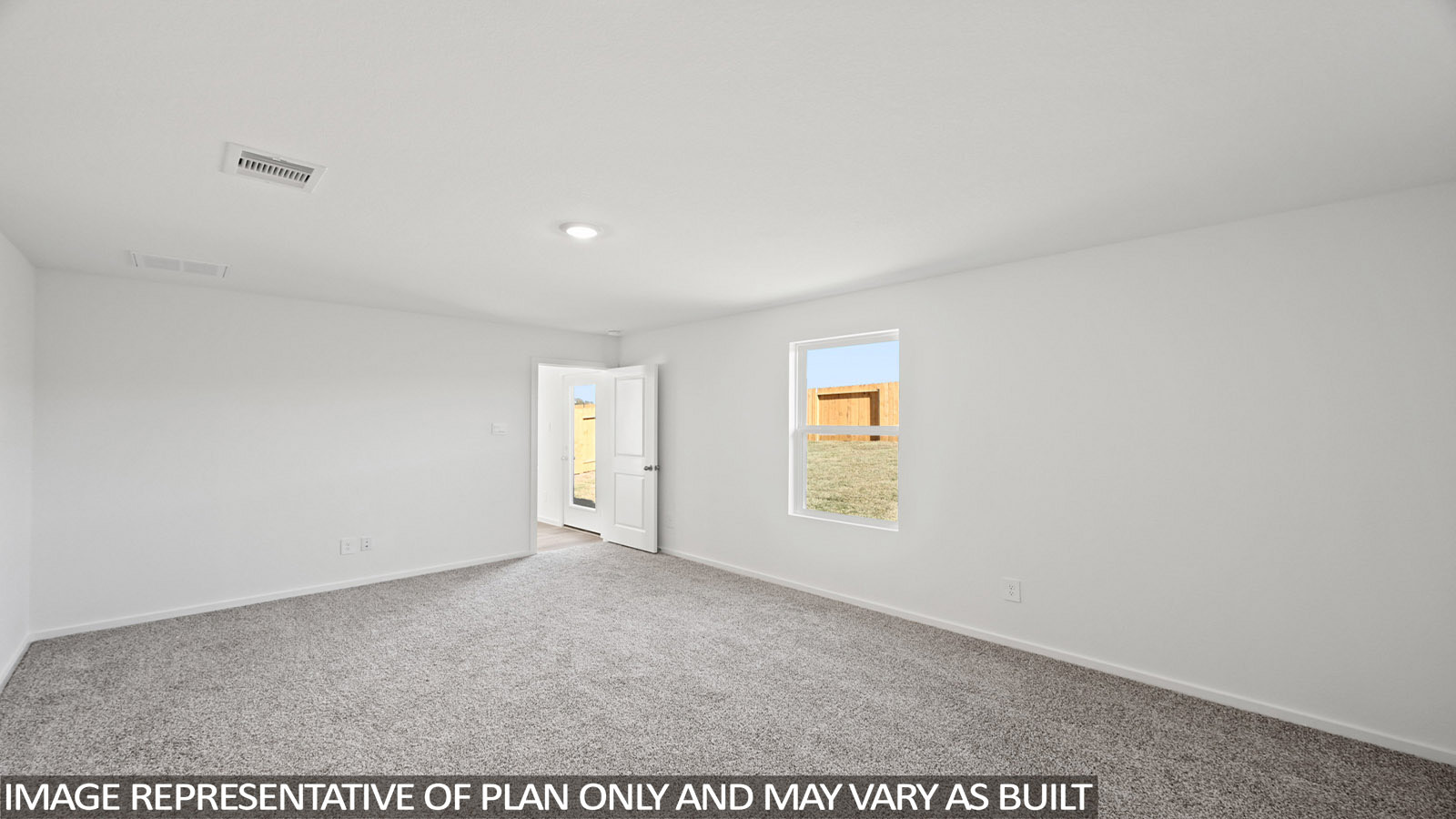 Callahan primary bedroom with carpeted flooring and window with natural lighting.