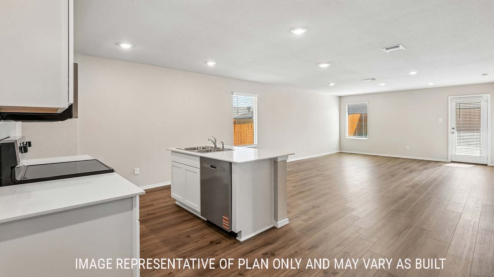 Callahan kitchen with kitchen island with view of open concept dining room and living room.