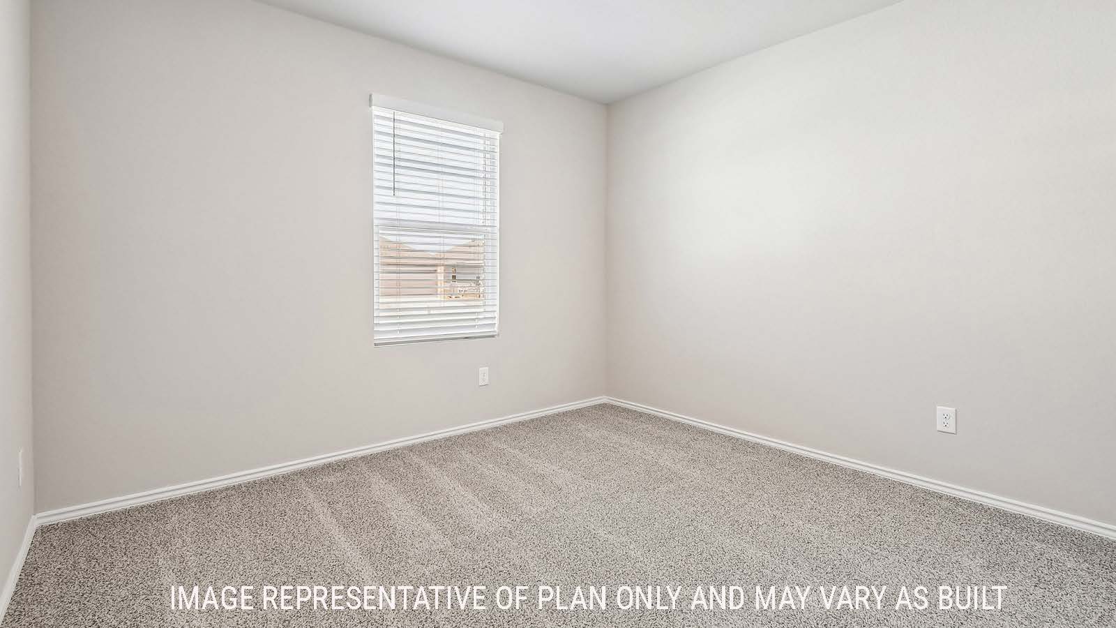Callahan secondary bedroom with carpeted flooring and window for natural lighting.