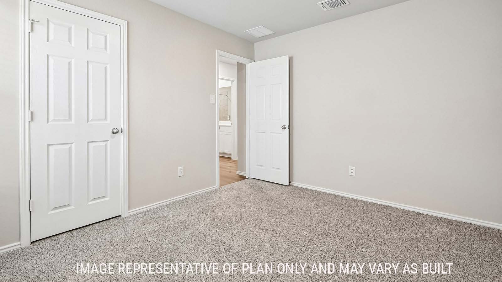 Callahan secondary bedroom with carpeted flooring and view of closet.