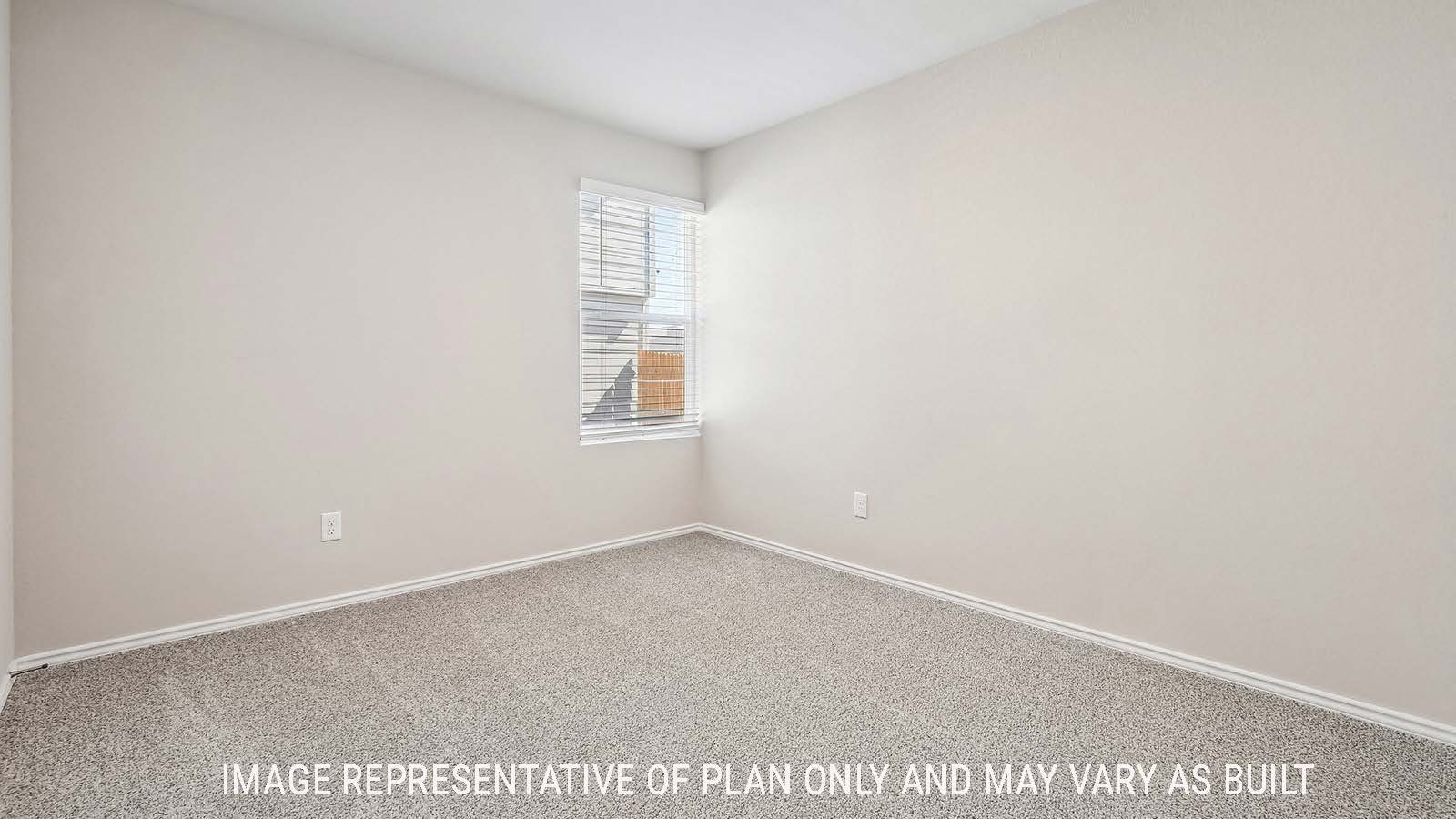 Callahan secondary bedroom with carpeted flooring and window for natural lighting.