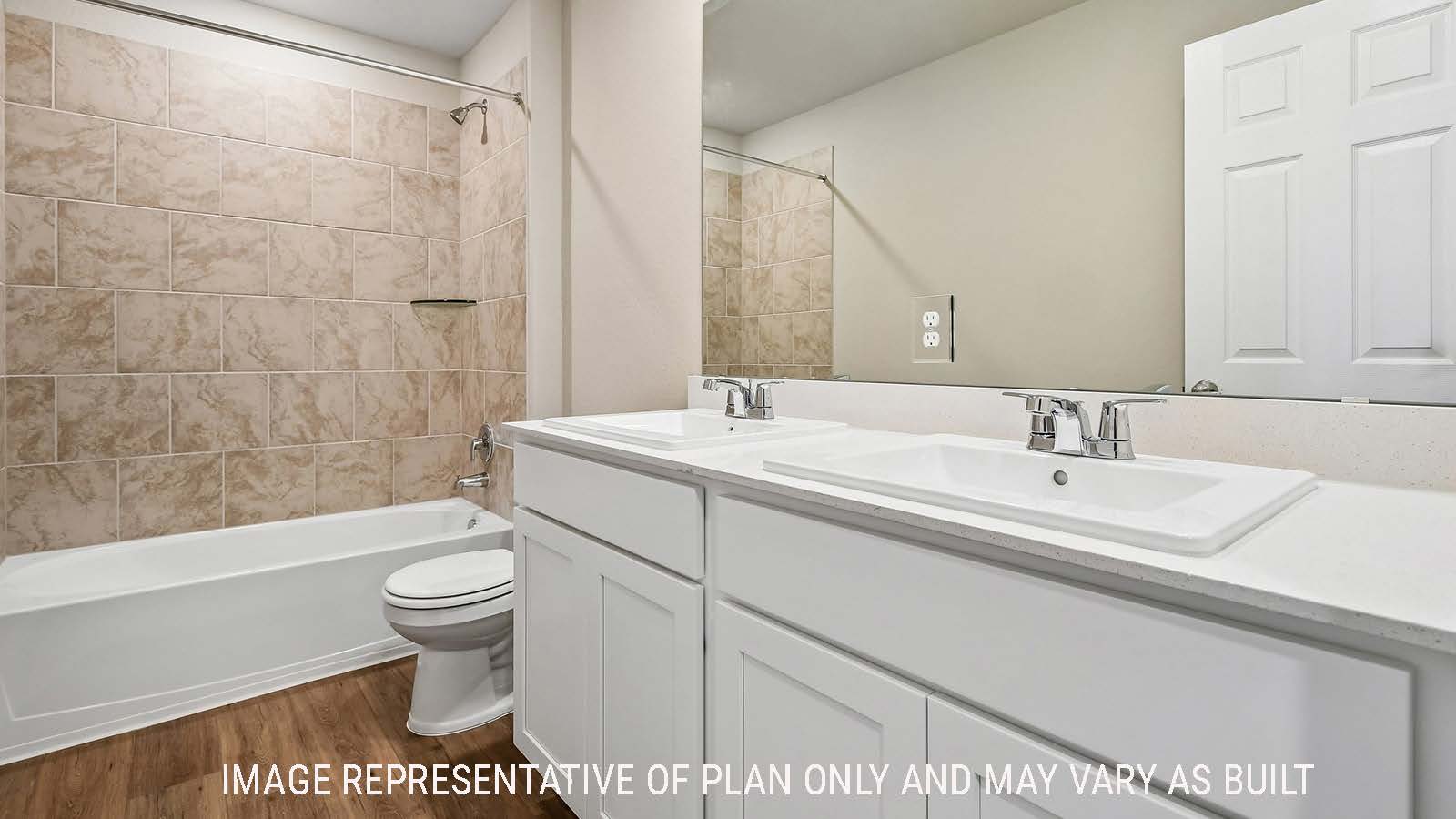 Callahan secondary bathroom with vanity sink with shower and tub combo.