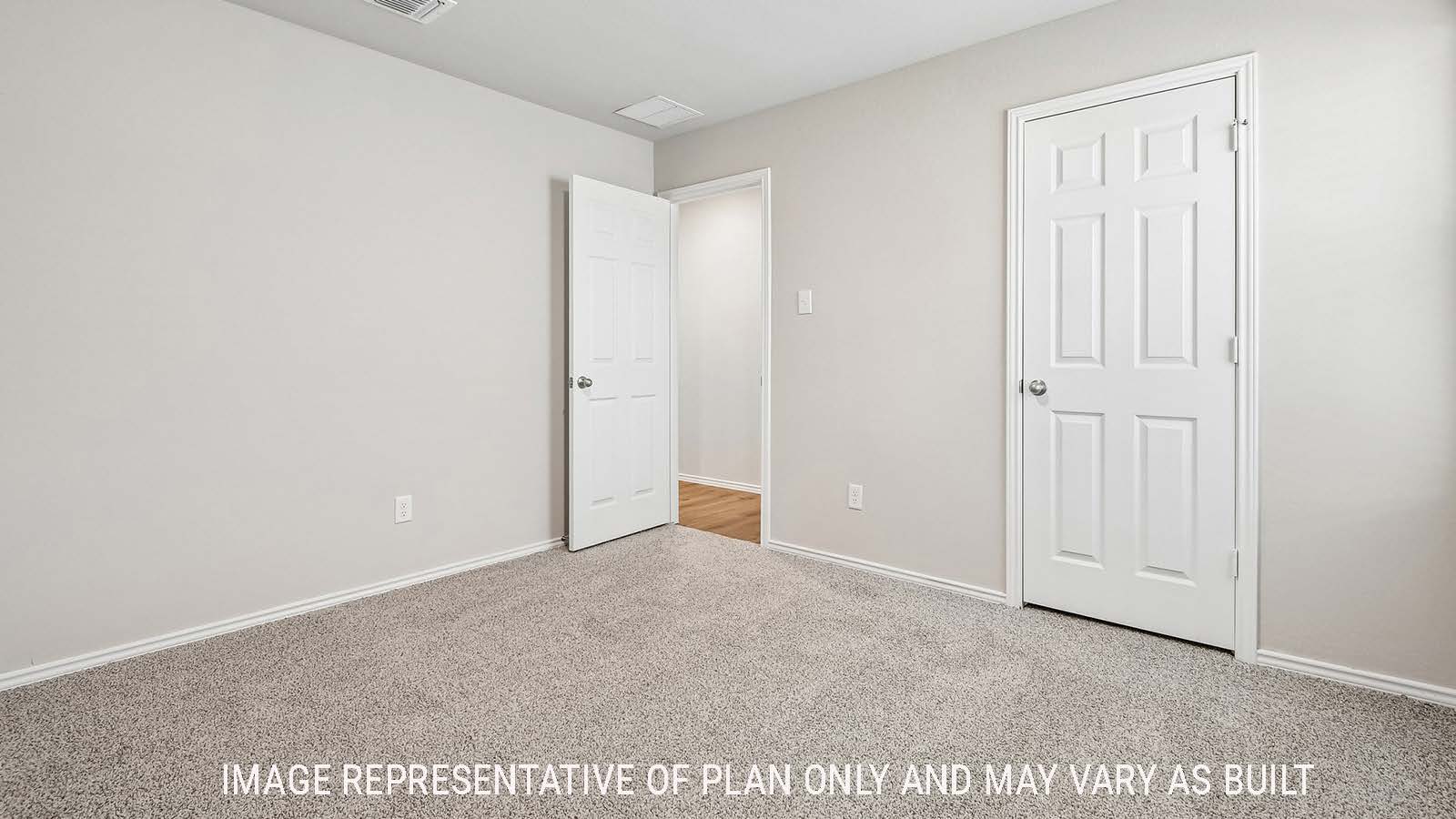 Callahan secondary bedroom with carpeted flooring and view of closet.