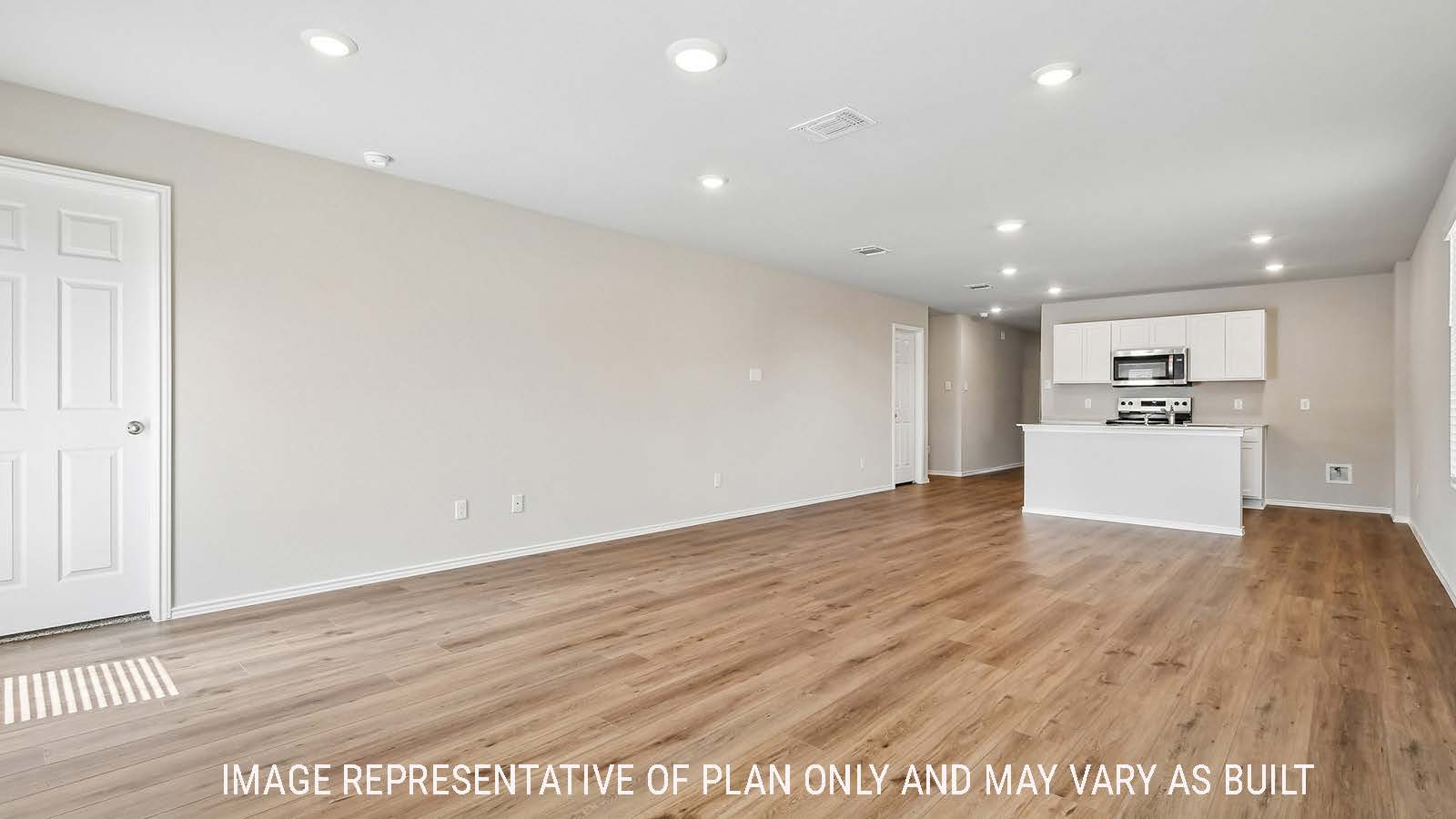 Callahan living room with view of open concept dining room and kitchen.