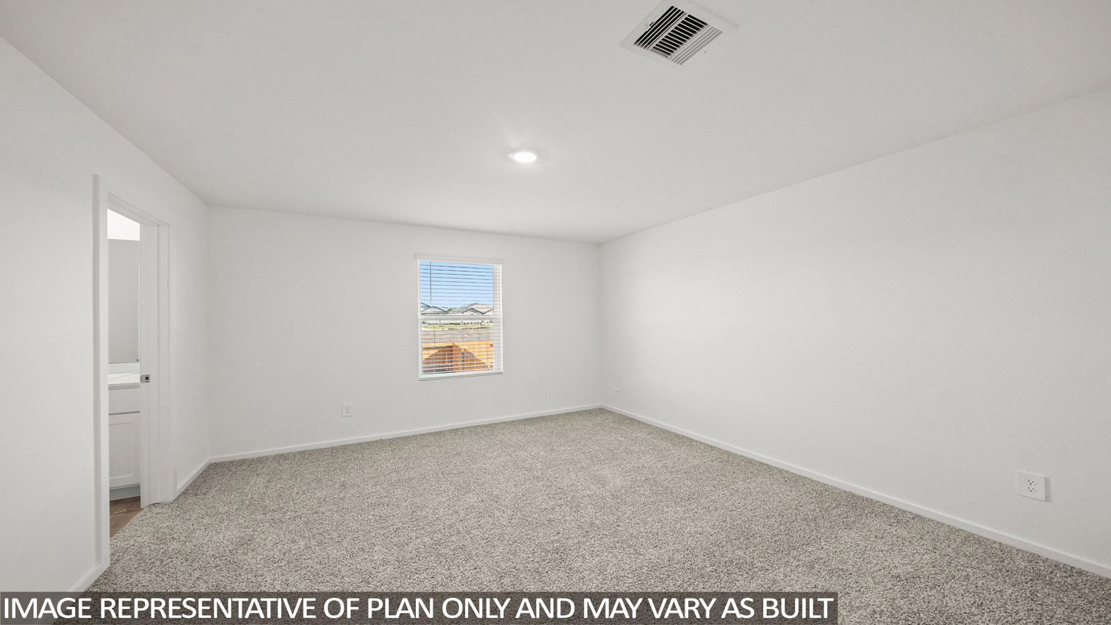 Dawson primary bedroom with carpeted flooring and view of primary bathroom.