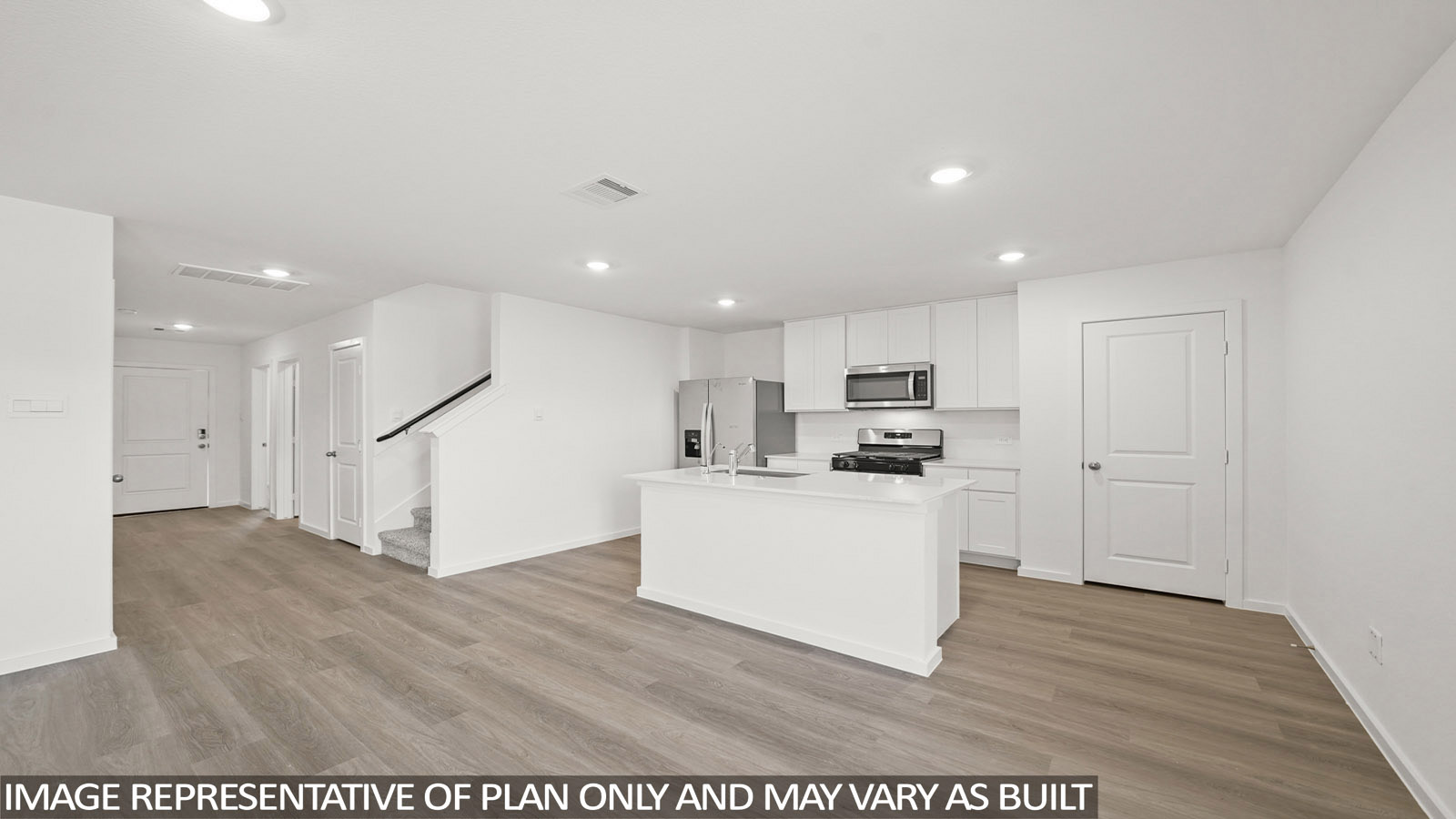 Dawson kitchen with kitchen island and white cabinets and countertops.