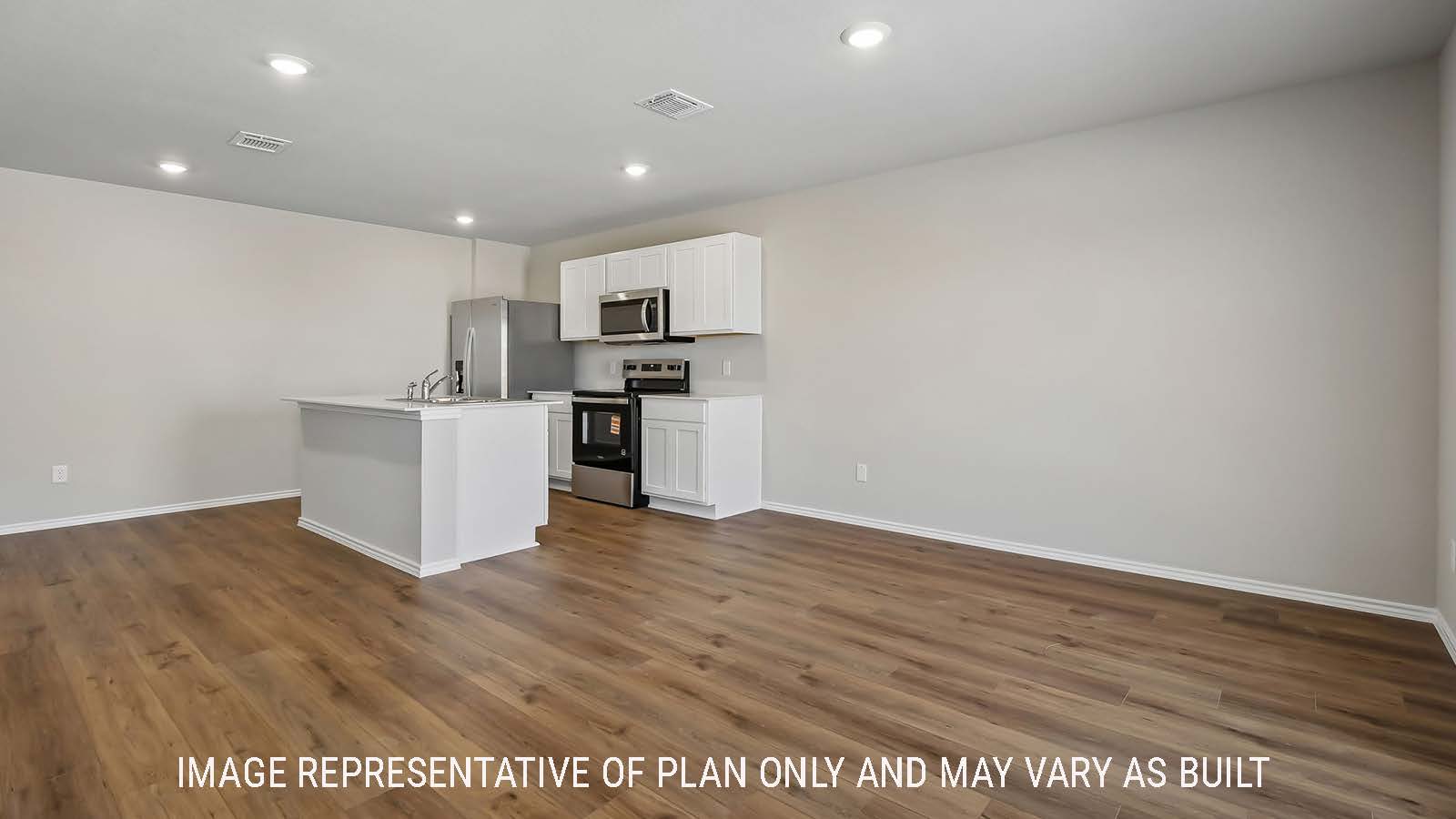 Austin dining room with view of open concept kitchen and light cabinets and granite countertops.