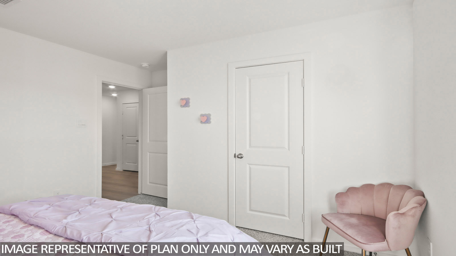 Austin secondary bedroom with carpeted flooring and view of hallway.