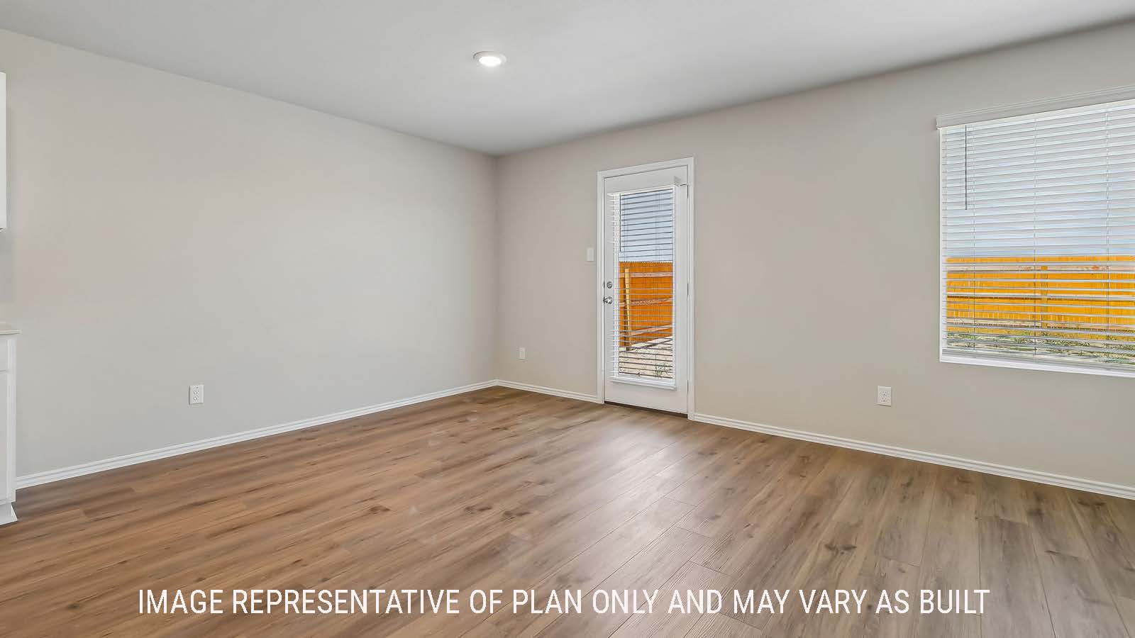 Austin dining room with window for natural lighting and view of back yard.
