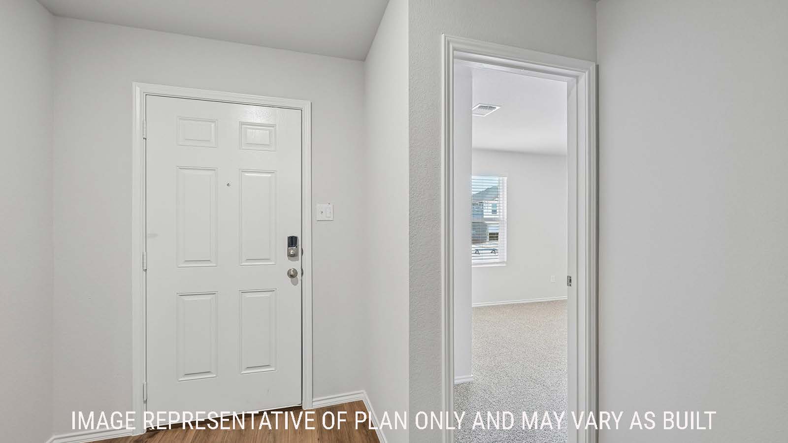 Baird entry hallway with view of front entry door and secondary bedroom.