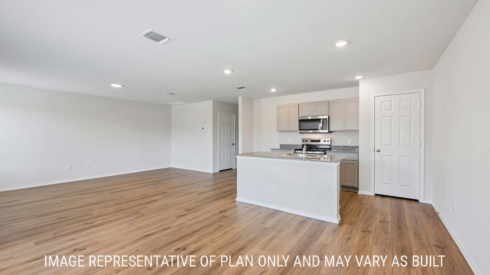 Baird dining room with view of open concept kitchen and living room.