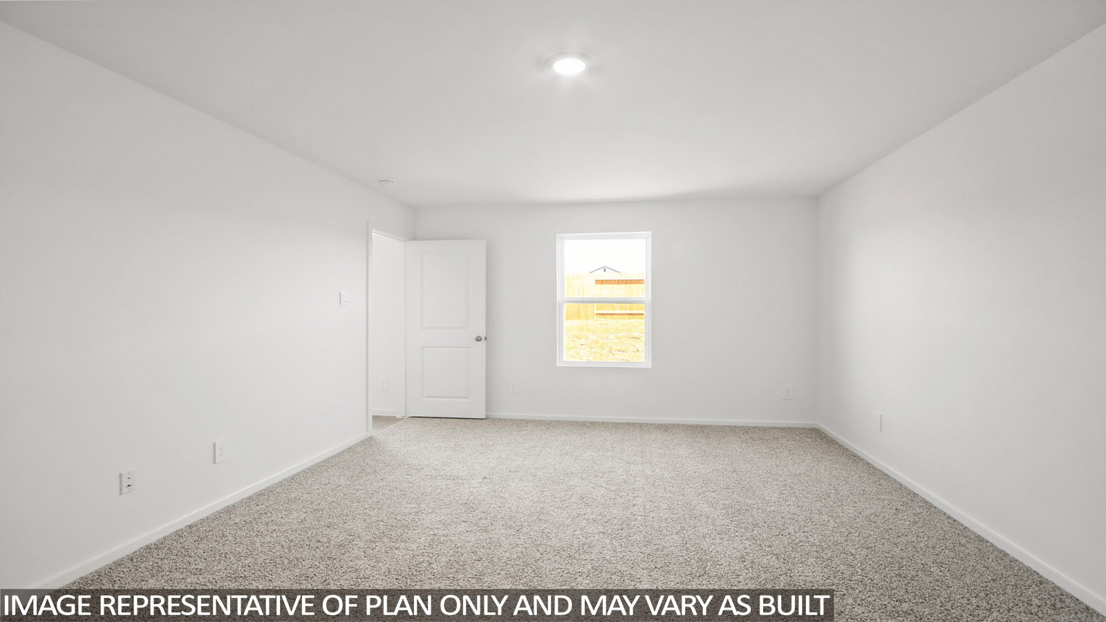 Baird primary bedroom with carpeted flooring and window for natural lighting.