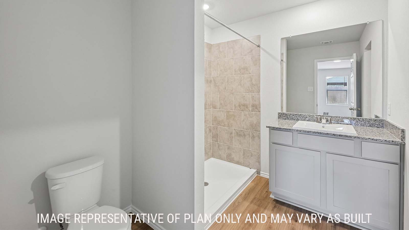 Baird primary bathroom with vanity sink and walk-in shower.