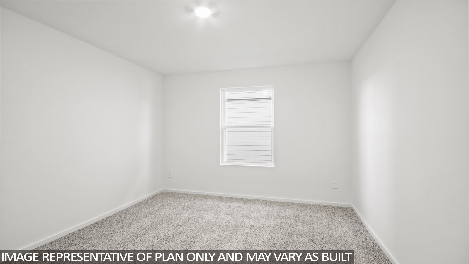 Baird secondary bedroom with carpeted flooring and window for natural lighting.
