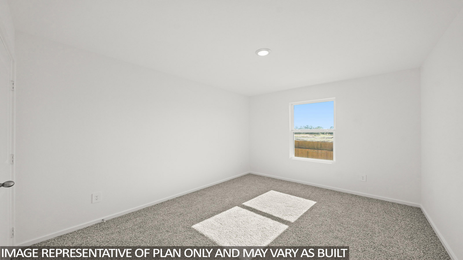 Cooper secondary bedroom with carpeted flooring and window for natural lighting.