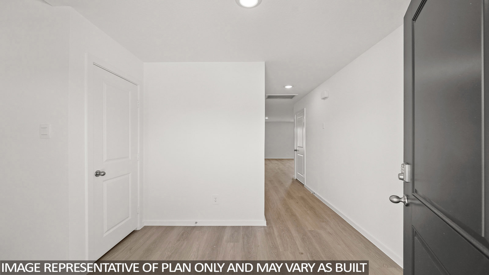 Cooper front hallway vinyl plank flooring with view of living room.