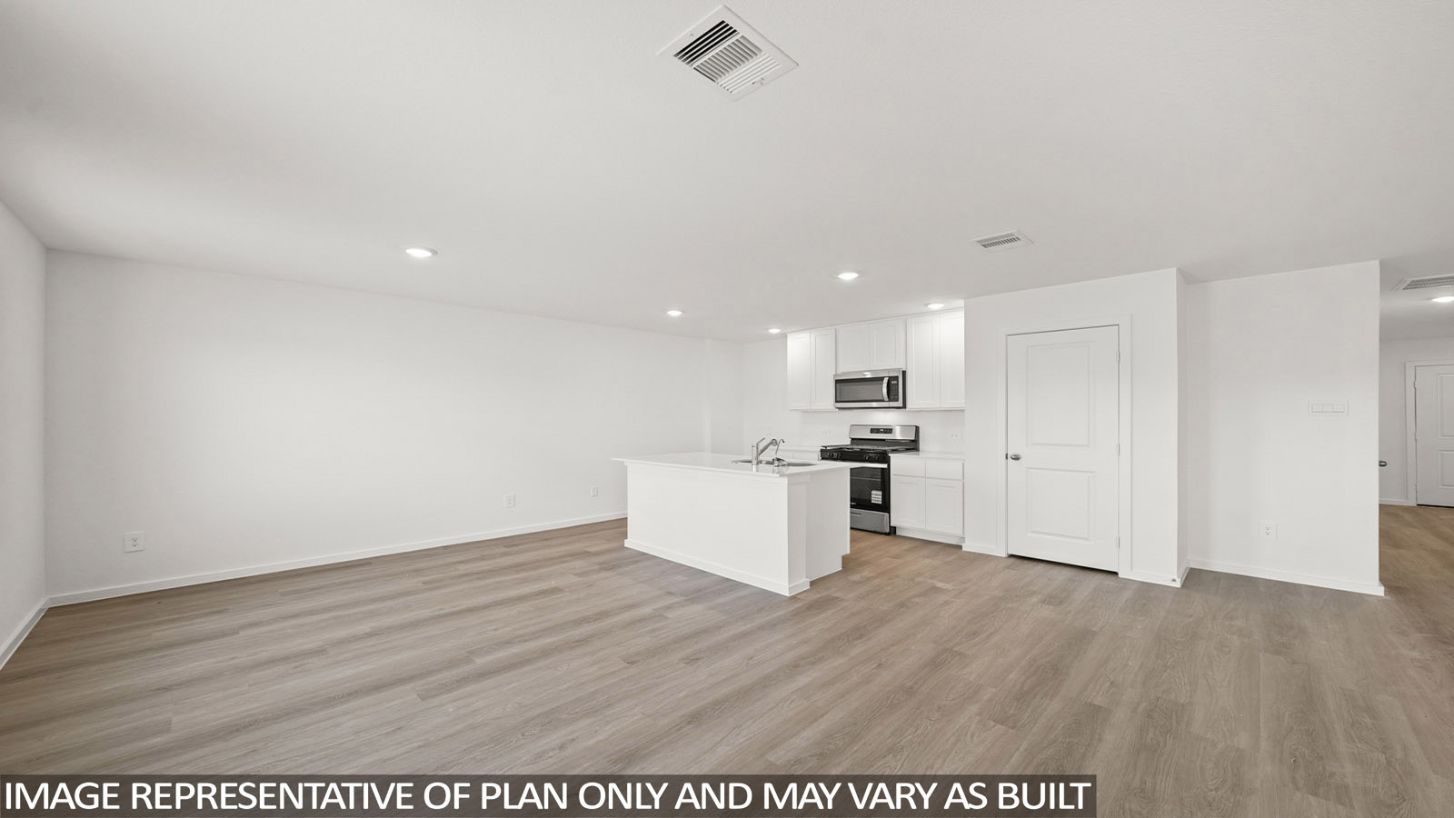 Cooper living room with vinyl plank flooring and view of open-concept dining room and kitchen.