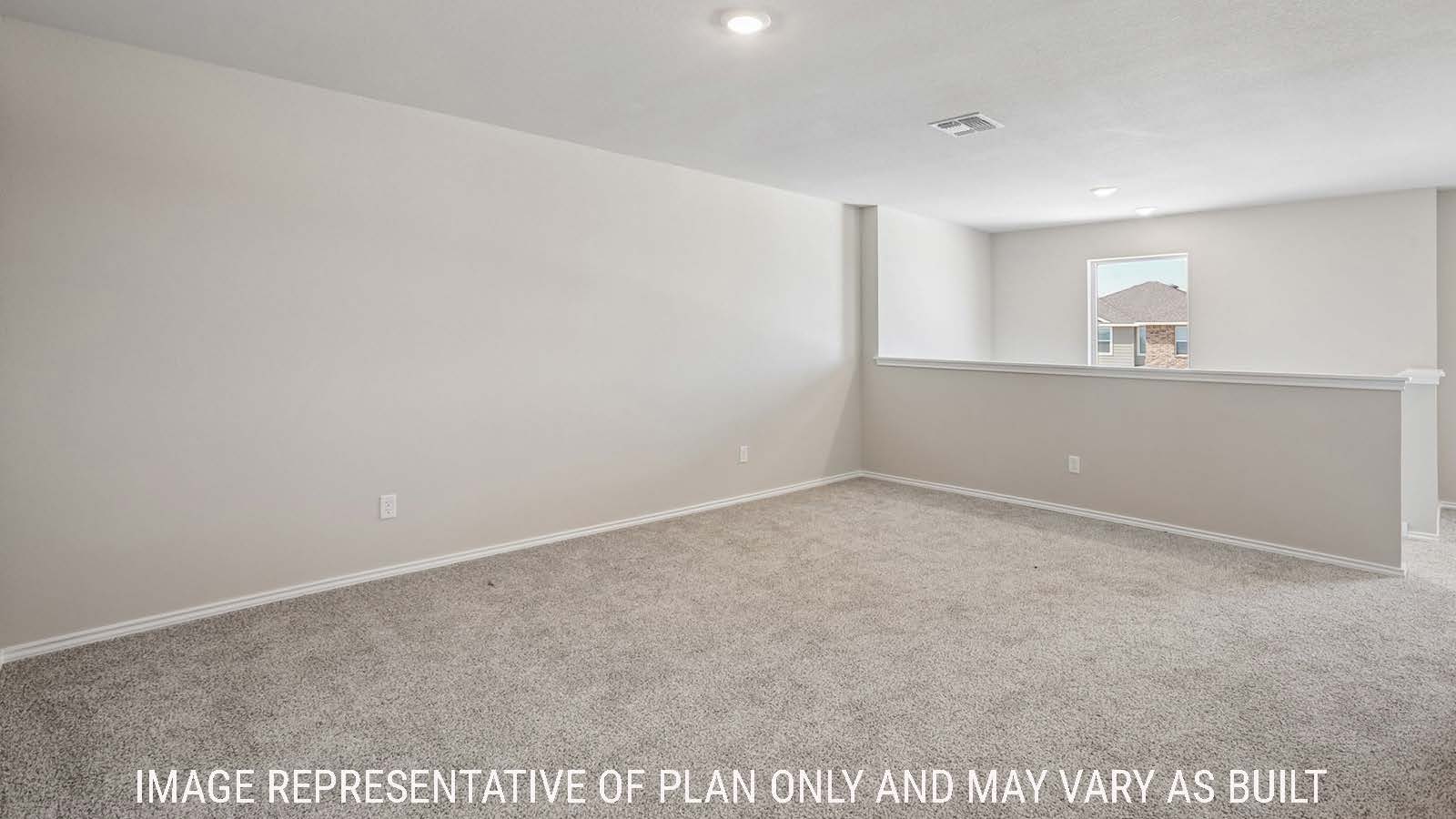 Cooper game room with carpeted flooring and window for natural lighting.