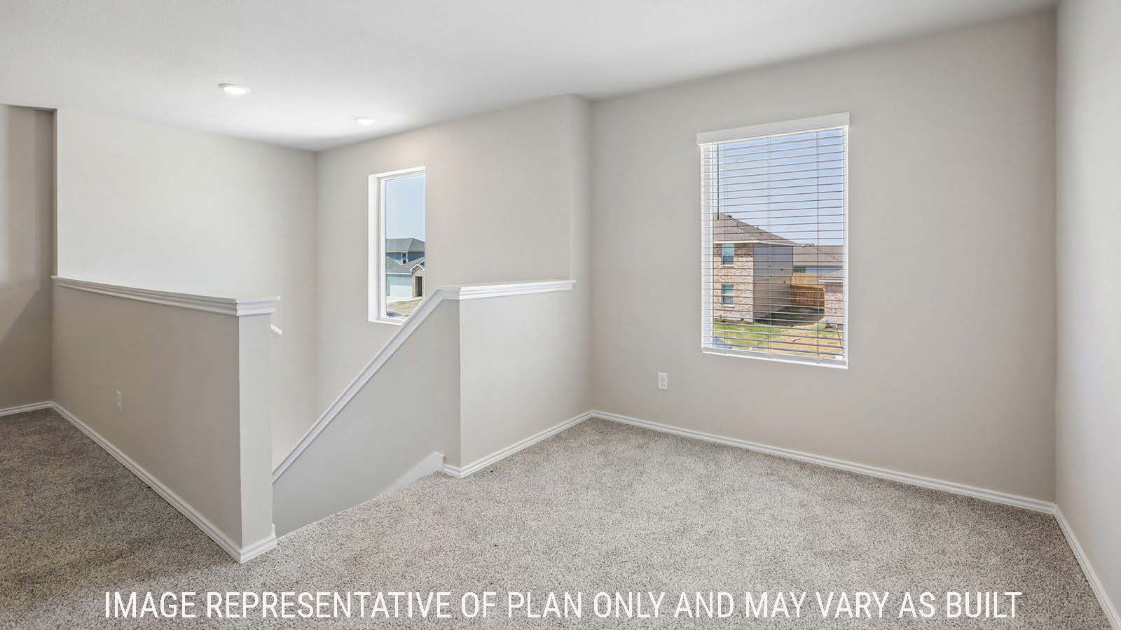 Cooper game room with carpeted flooring and window for natural lighting.
