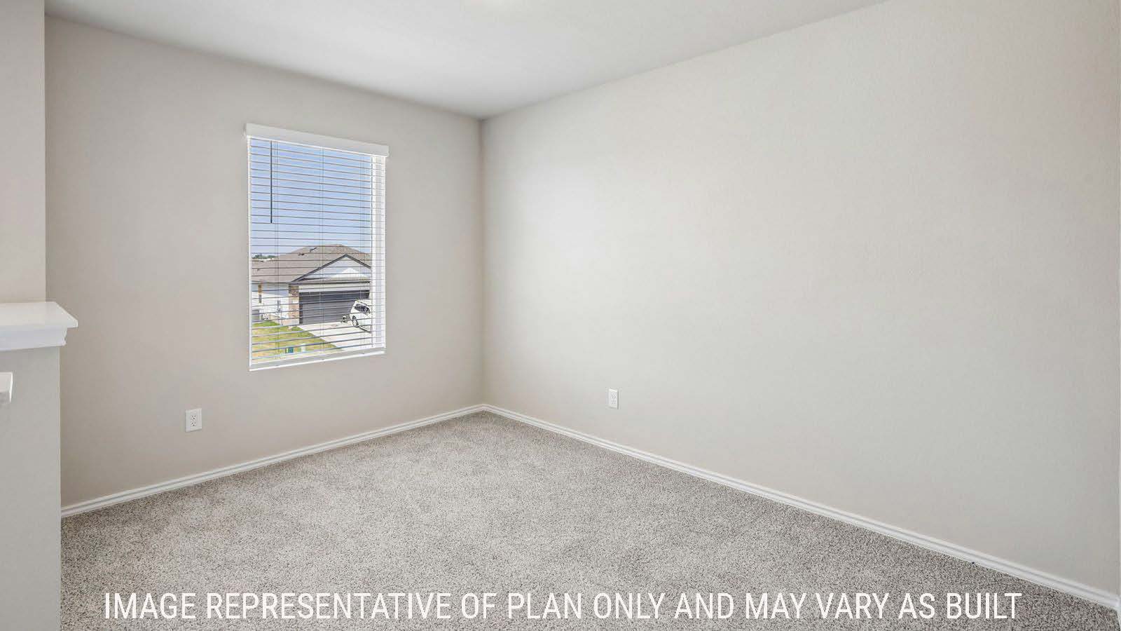 Cooper game room with carpeted flooring and window for natural lighting.