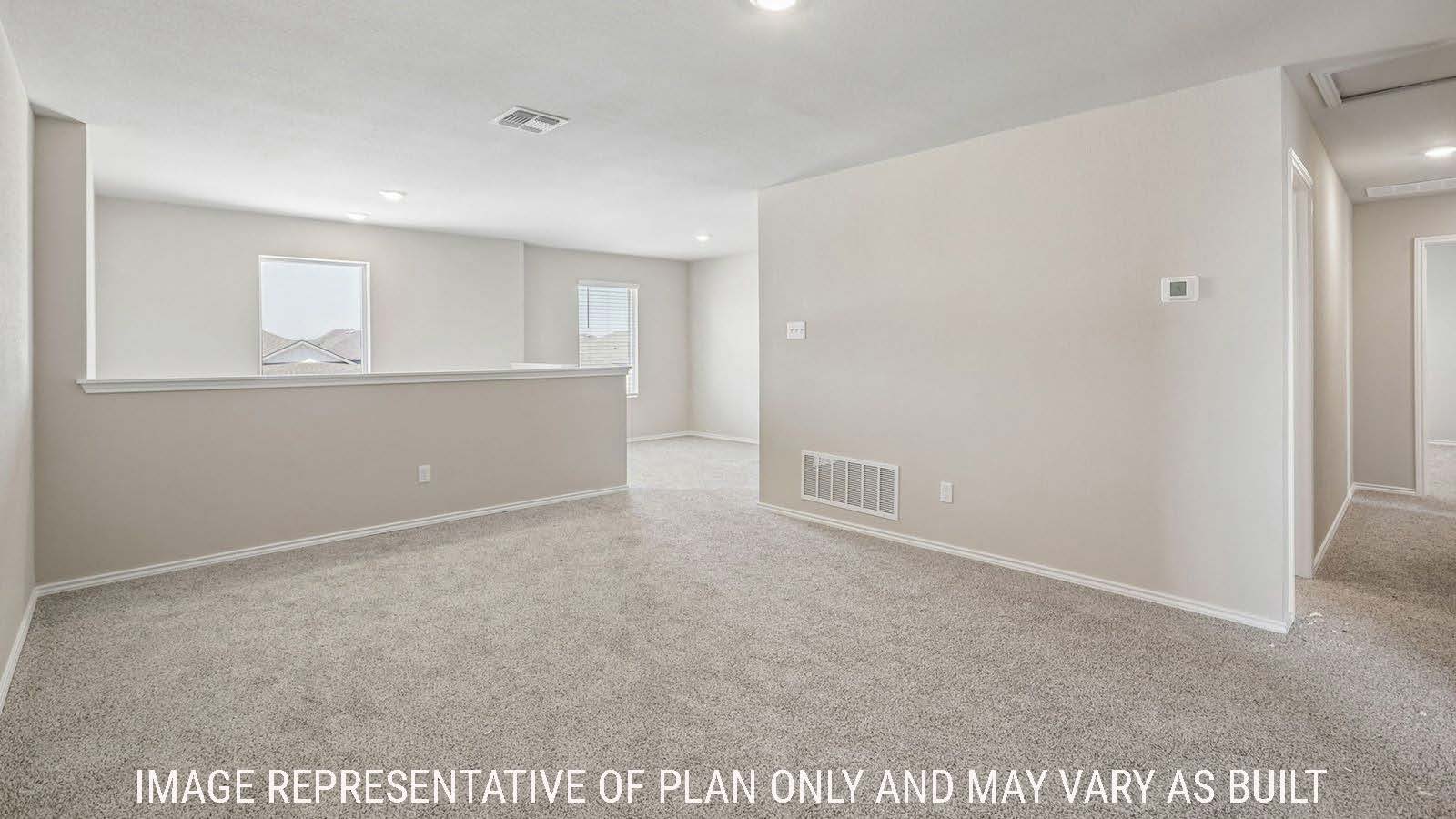 Cooper game room with carpeted flooring and window for natural lighting.
