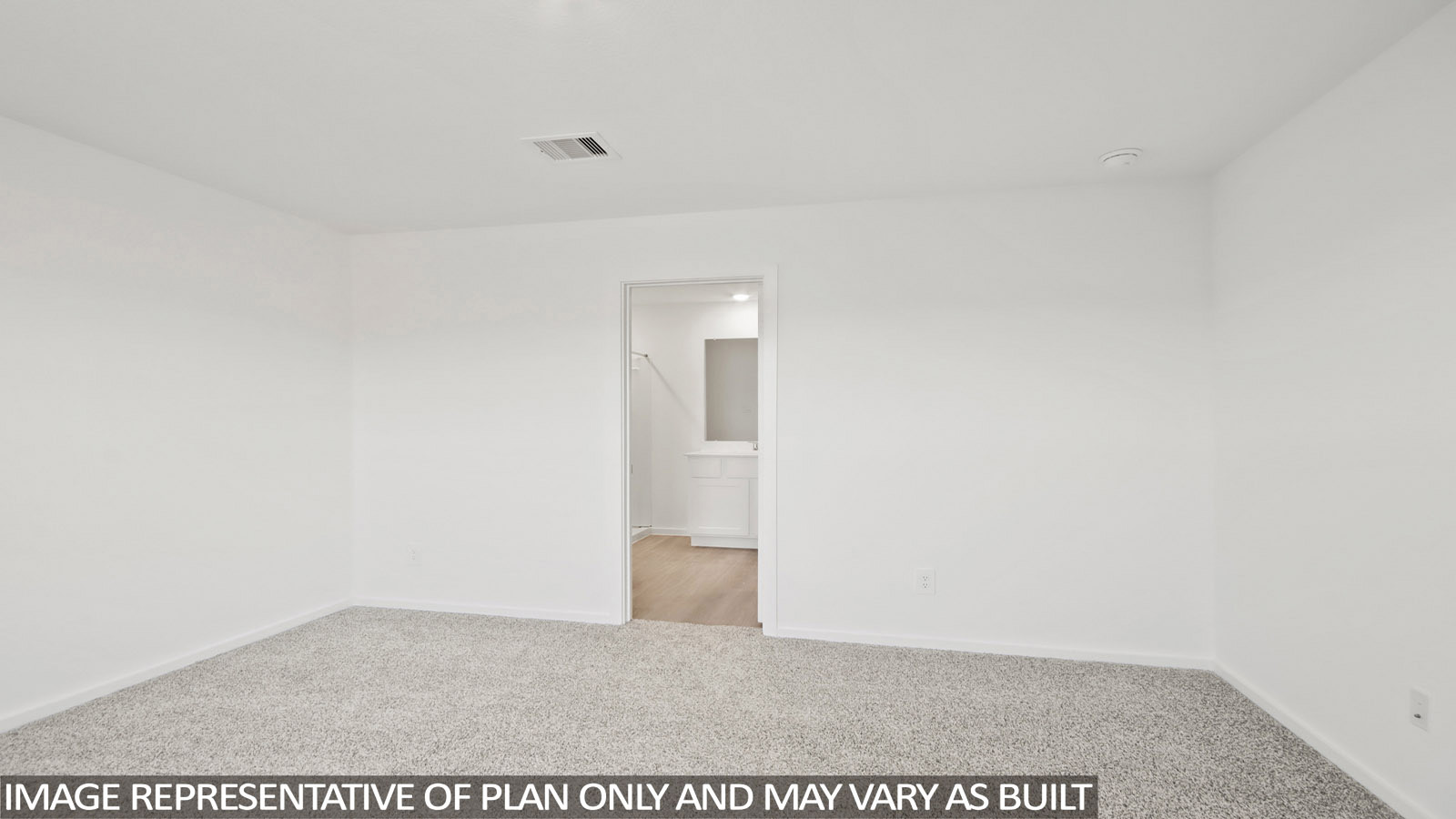 Denise primary bedroom with carpeted flooring and view of primary bathroom.