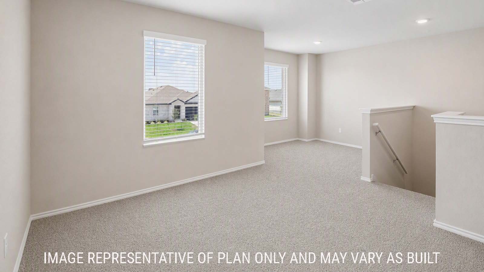 Denise game room with carpeted flooring and windows for natural lighting.