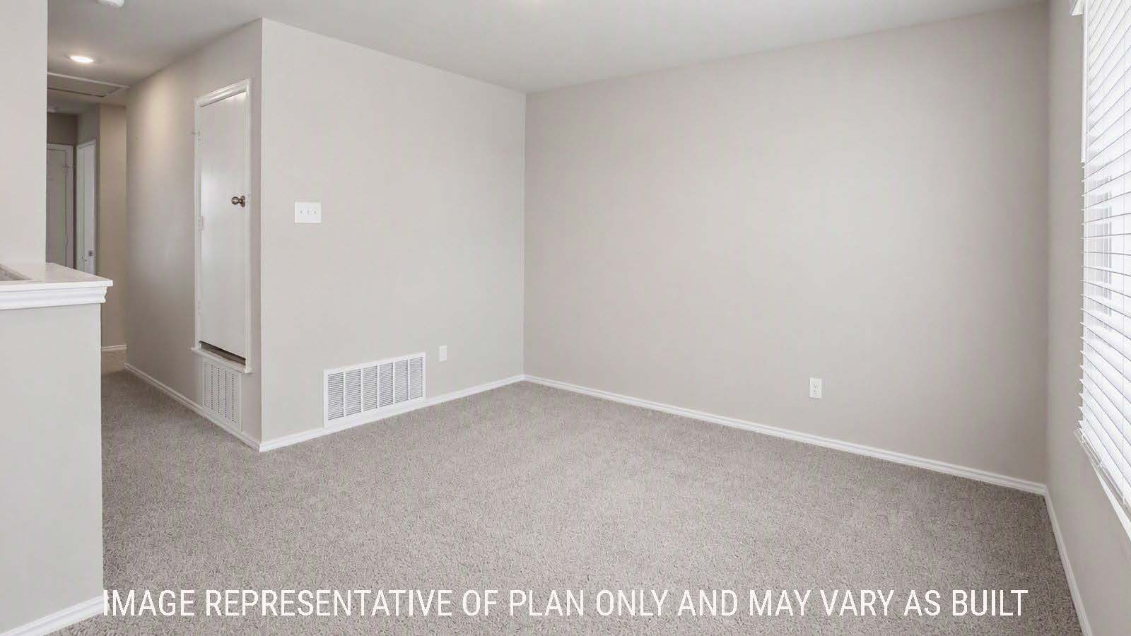 Denise game room with carpeted flooring and view of secondary bedrooms.