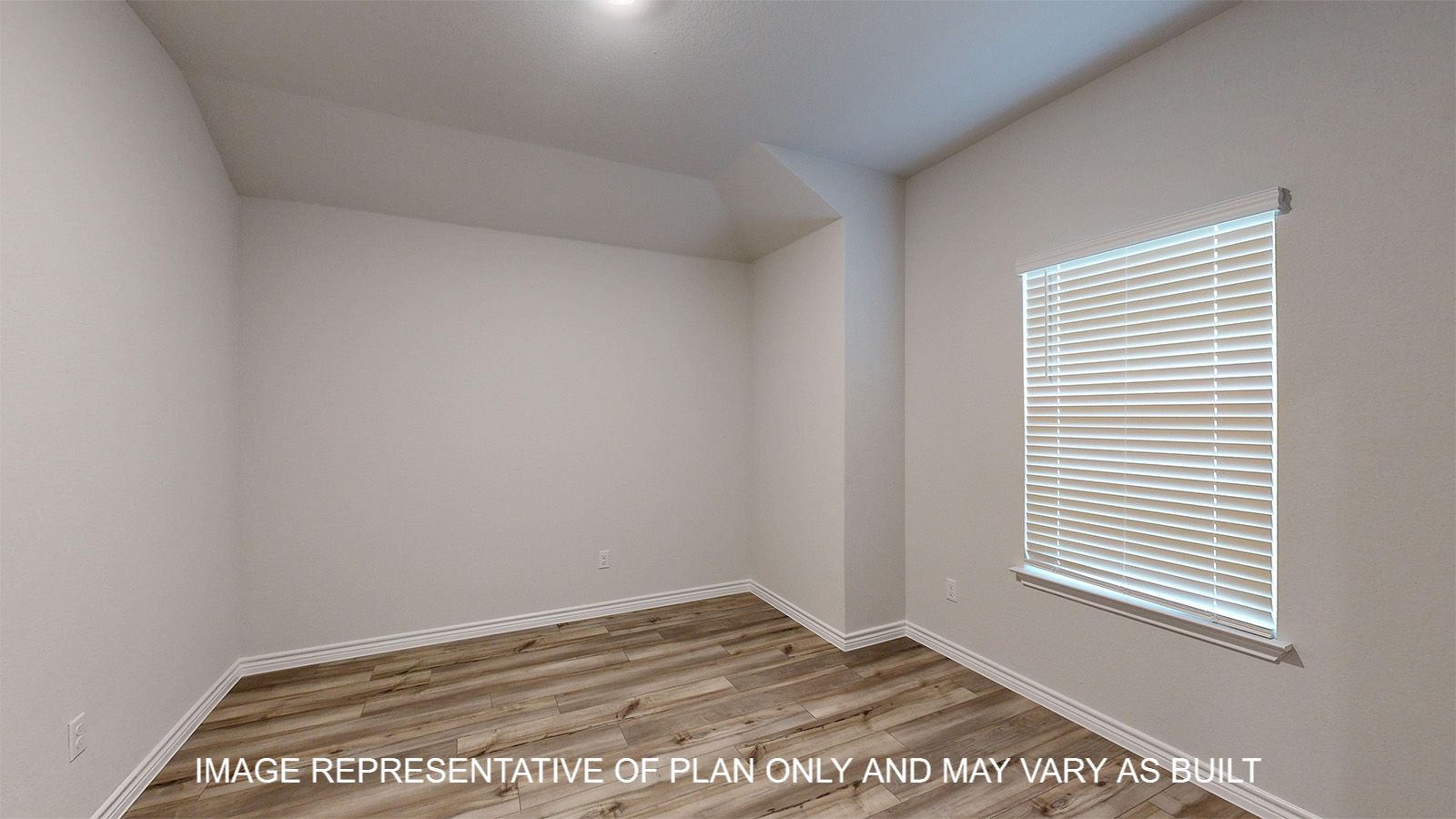 Everett study with vinyl plank flooring and window.