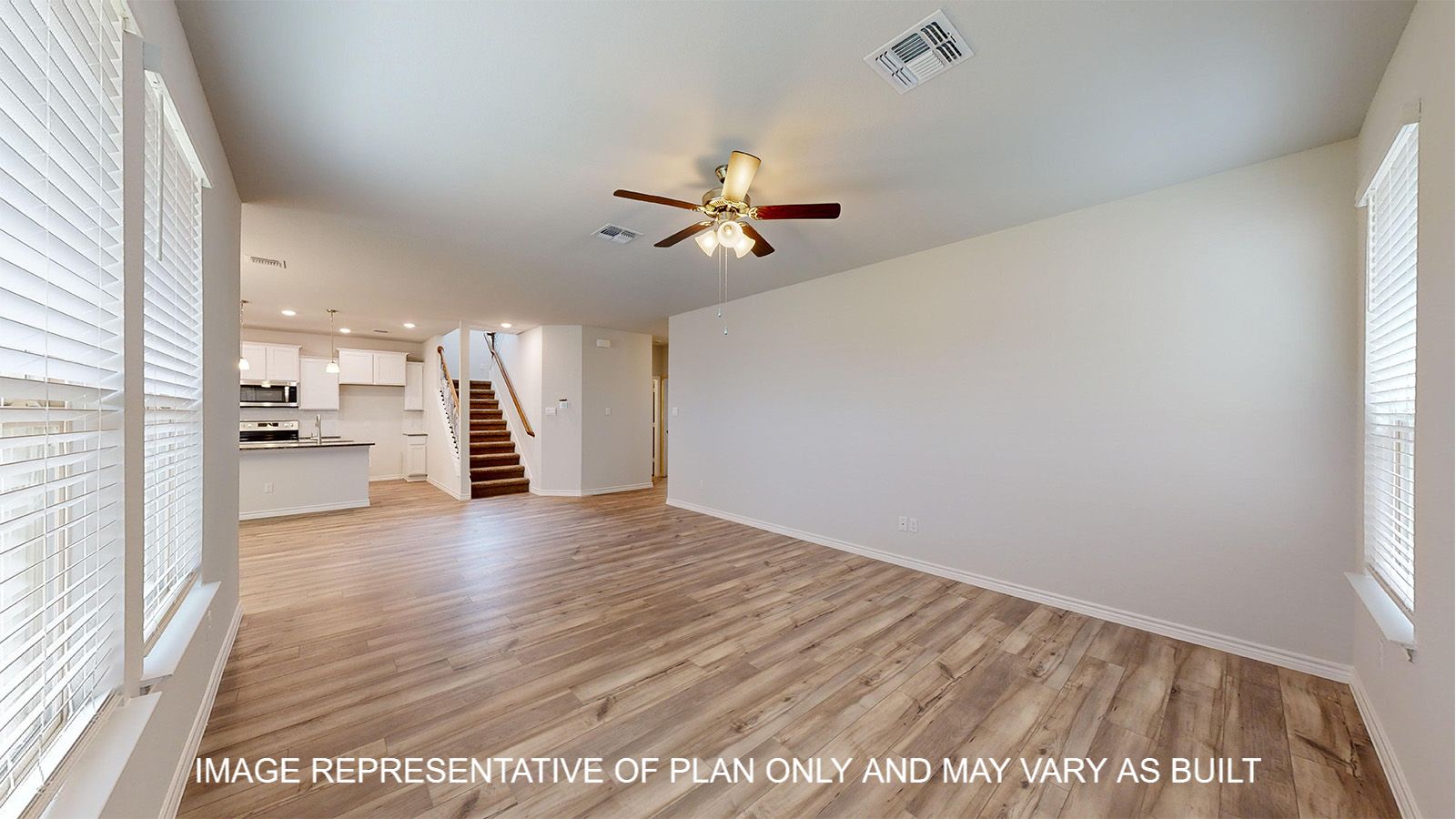 Magnolia living room with vinyl plank flooring.